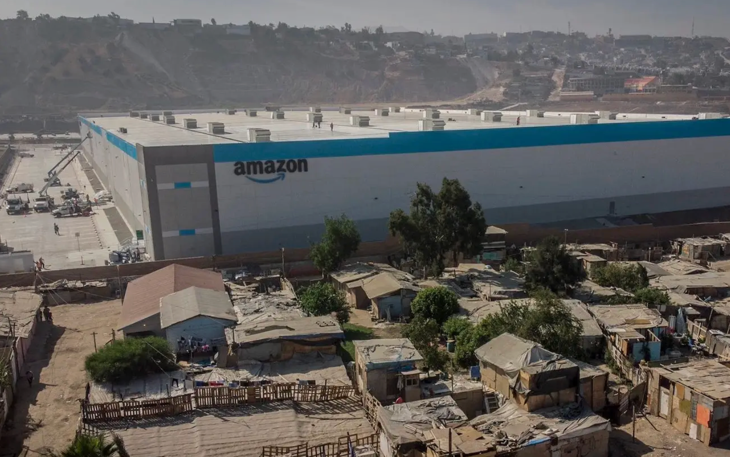 Amazon accused of breaking promises to transform Tijuana neighbourhood